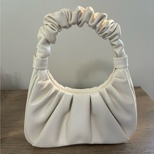 JW PEI leather bag in cream.
